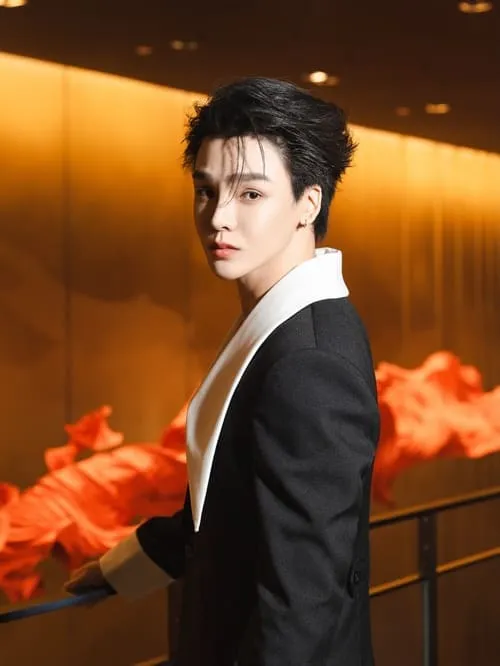 theme-phubeth-atarunwong-hinh-anh-1 Theme Phubeth Atarunwong vest đen cổ trắng nền cam